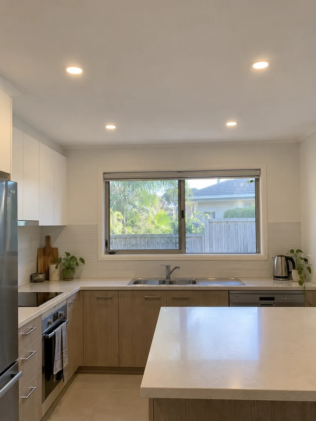 Recessed downlights in a modest kitchen
